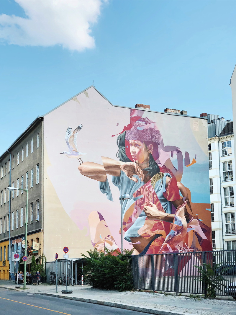 two, color, dom, smiling, cloud - sky, mural, outdoors, one person, billboard, casual clothing, street, building exterior, 4K, animal, front view, lost