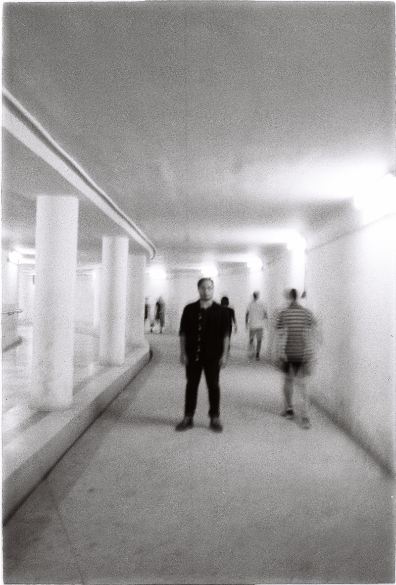 long sleeve, man, tunnel, corridor, transfer print, clothing, building, architecture, blackandwhite, lighting, arcade, indoors, people, auto post production filter