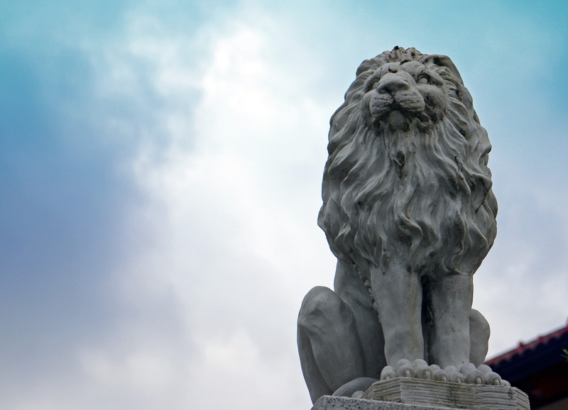 sculpture, rock carving, statue, stone figure, sky, representation, lion, mammal, animal wildlife, figure, architecture, human representation, creativity