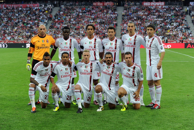 professional Sport, sports Uniform, athlete, sports Venue, males, football, grass, front view, day, red, people, winning, success, playing
