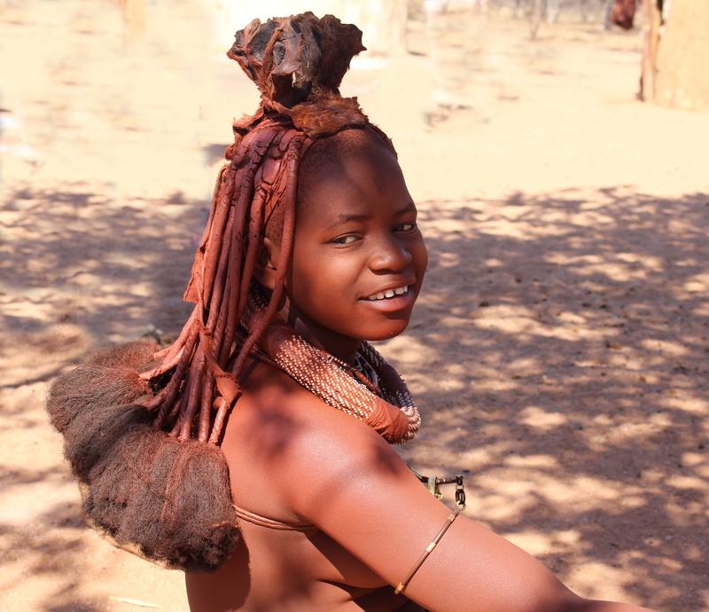 Africa, day, Namibia, standing, traditional, outdoors, clothing, waist up, focus on foreground, one woman only, one person, land, hair, leisure activity