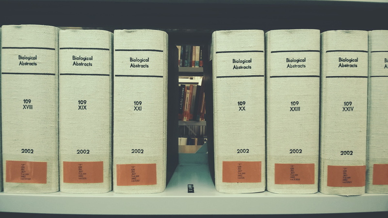 library, indoors, stack, still life, order, container, shelf, communication, no people, text, photo, close-up, photography, education, large group of objects