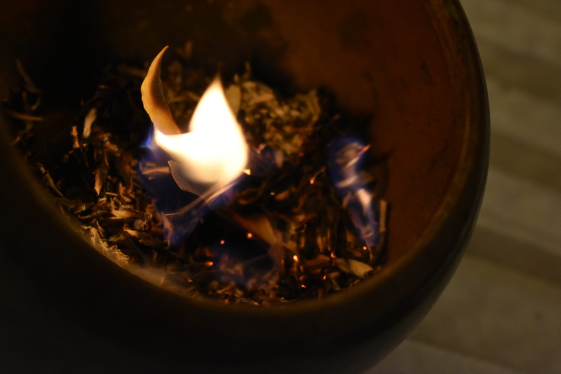single object, cleanse, sage, food and drink, motion, saging, selective focus, smoke, heat - temperature, illuminated, indoors, wood, las vegas, high angle view