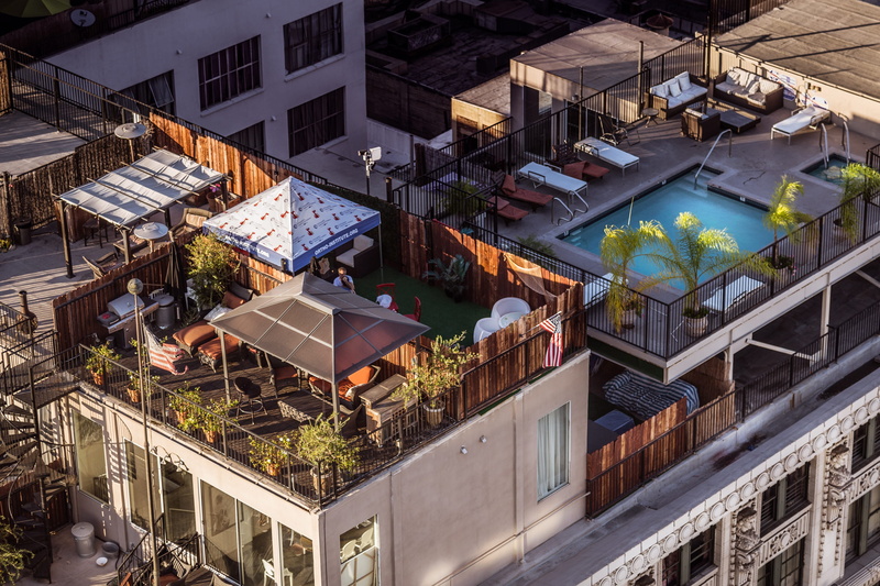 architecture, downtown, 2K, high angle view, potted plant, house, outdoors, top view, los angeles, built structure, balcony, los angeles downtown, building