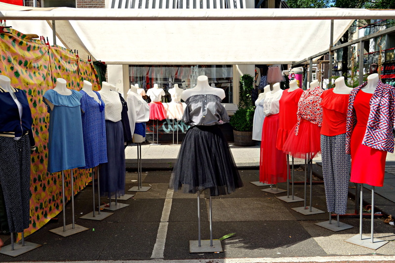 lot, clothing store, exhibit, sale, in a row, women fashion, retail display, shopping, large group of objects, hanging, coathanger, Women, yard, group of people