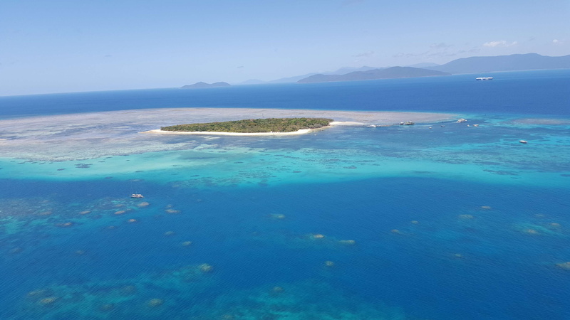 tranquility, water, paradise, land, nature, aerial view, outdoors, no people, blue, mountain, lagoon, ocean, beauty in nature, beach, sea, turquoise colored
