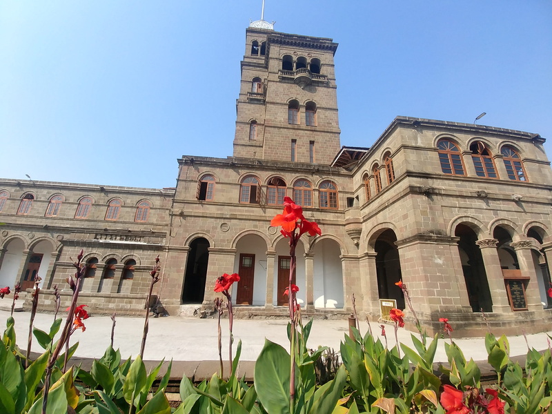 low angle view, nature, pune, city, travel, arch, facade, history, clear sky, travel destinations, building exterior, india, flower, day, blue, built structure