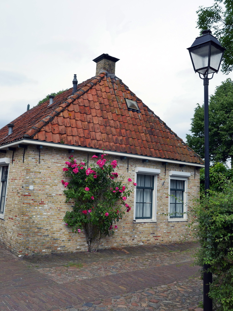 sky, historically, fortress, built structure, tourism, plant, cloud - sky, netherlands, open air museum, places of interest, building Exterior, roof tile