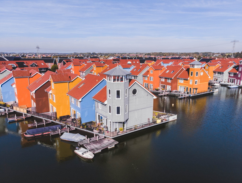 no people, outdoors, building exterior, residential district, water, nature, city, cloud - sky, built structure, sky, row house, building, groningen, mode of transportation