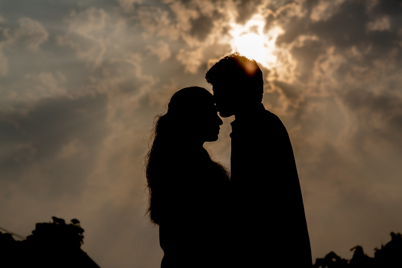 sunset, real people, outdoors, positive emotion, two people, bonding, togetherness, silhouette, hyderabad, couple - relationship, sky, india, men, low angle view