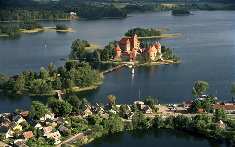green color, tree, water, Lithuania, day, built structure, high angle view, group of people, nature, Trakai, scenics - nature, lake, real people, rock