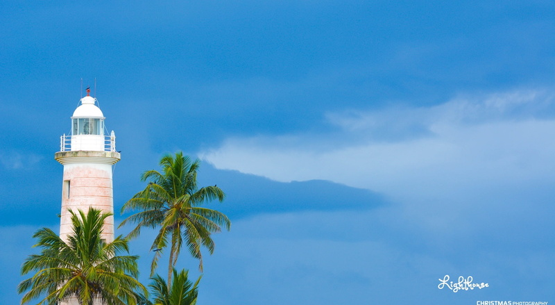 travel destinations, blue, building, building exterior, palm tree, cloud - sky, day, travel, Sun and Sky, tower, lighthouse, tropical climate, no people