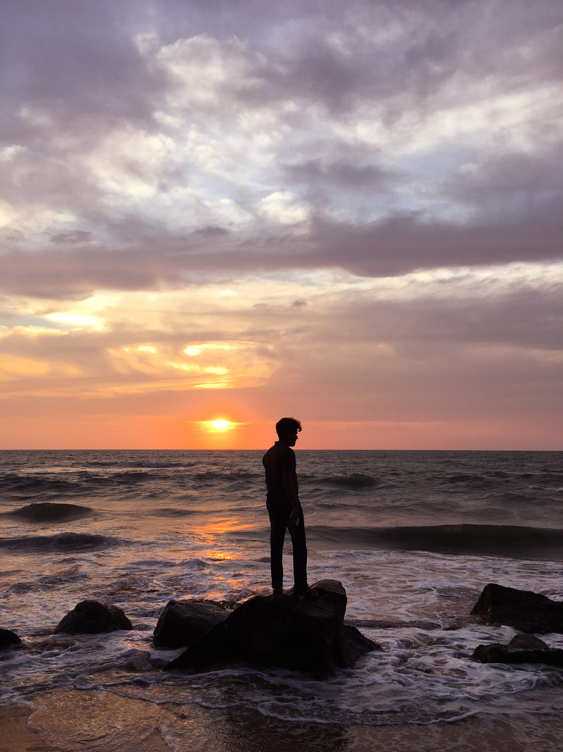 ocean, water, man, light, 2 galle rd, beauty in nature, nature, promontory, horizon, rock, scenics - nature, sea, real people, standing, human, one person
