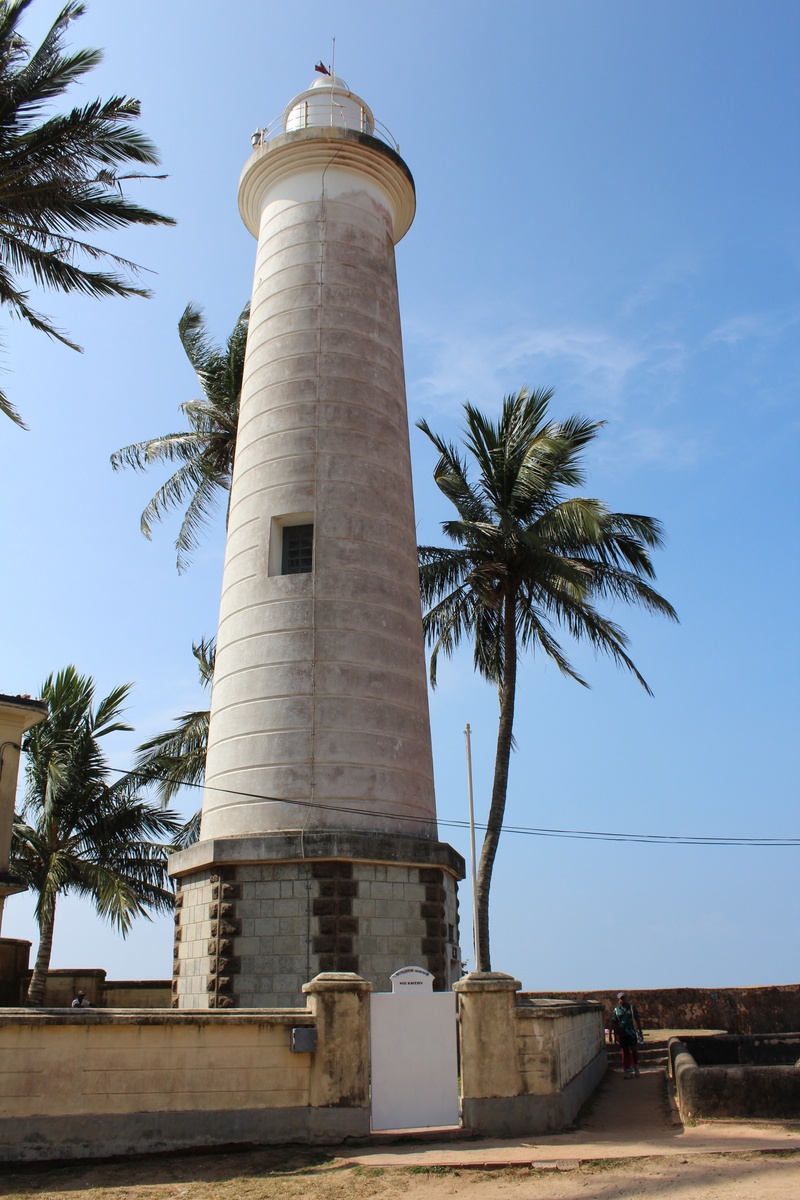 tower, guidance, low angle view, tropical climate, tree, day, coconut palm tree, palm tree, sri, direction, no people, sky, fort, outdoors, architecture