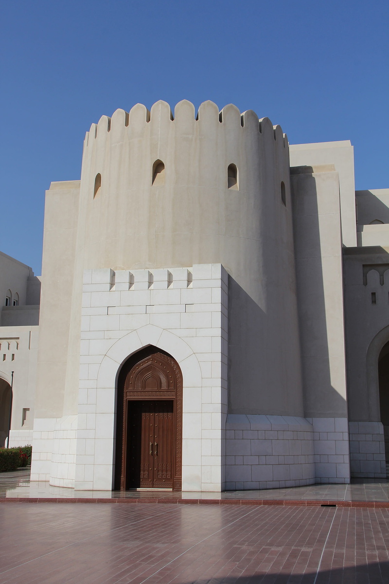 sunlight, day, history, architecture, spirituality, built structure, low angle view, oman, clear sky, religion, city, the past, building exterior, belief