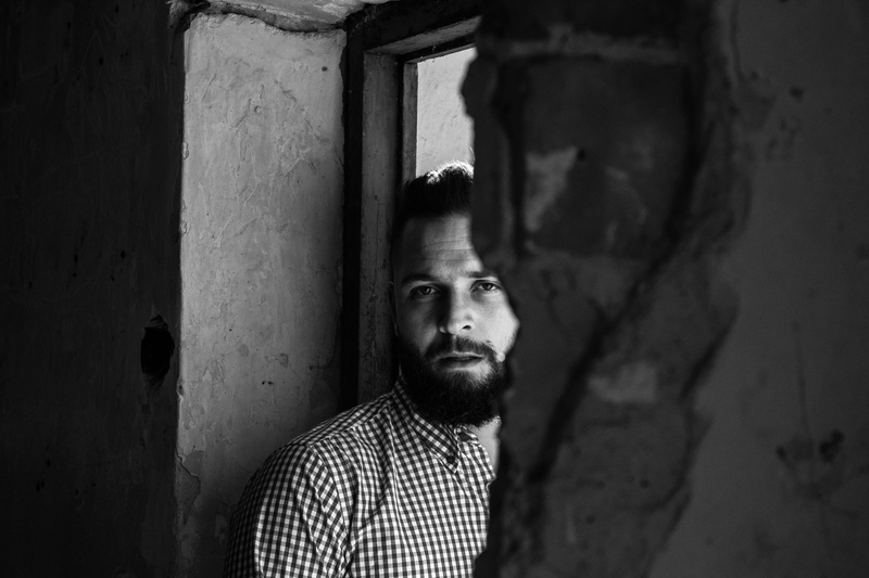 adult, lifestyles, ruin, looking, beard, outdoors, hole, fashion, one Person, dark, frame, male, males, dirty, leaning, style, model, indian Ethnicity