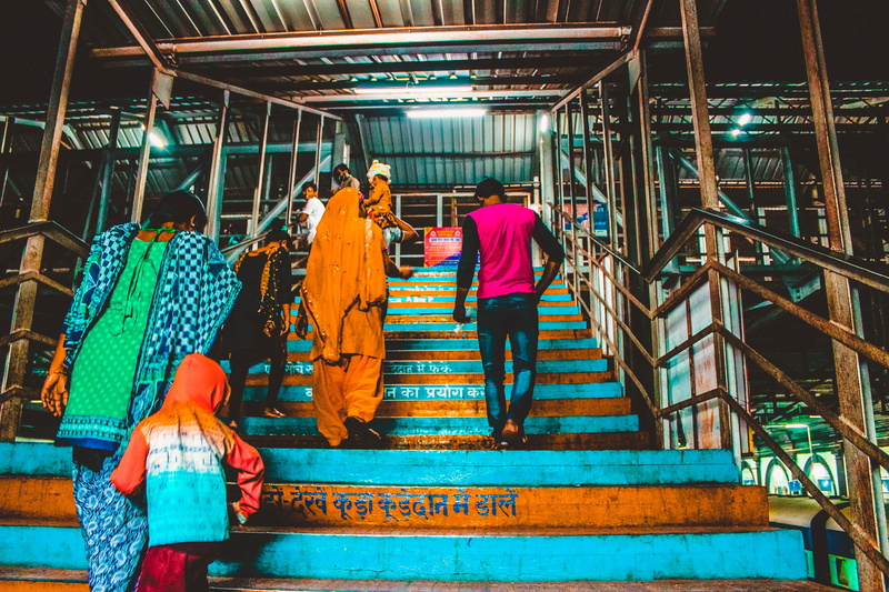 standing, walking, group, train station, 5K, street, india, railing, men, staircase, built structure, group of people, real people, medium group of people