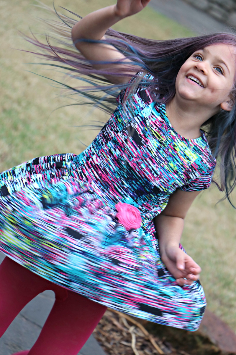 casual clothing, one person, leisure activity, childhood, colors, happiness, spinning, botanic garden boulevard, day, smiling, enjoyment, child, 4K, lifestyles