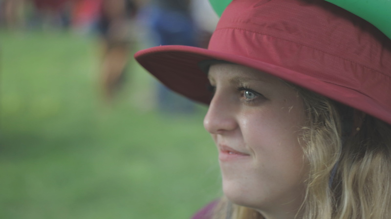 real people, hairstyle, hat, canyon, red, united states, west texas aandm university, happy, green, beautiful woman, young adult, clothing, profile view