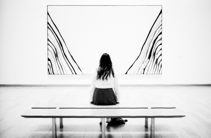 museum, photo, sitting, hairstyle, grayscale, lifestyles, clothing, long hair, woman, one person, women, adult, united states, skirt, day, relaxation, real people