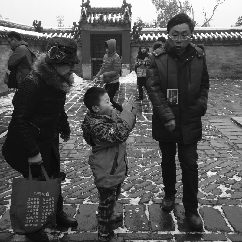 lifestyles, females, innocence, leisure activity, photography, men, group of people, standing, togetherness, looking at camera, building, child, photograph