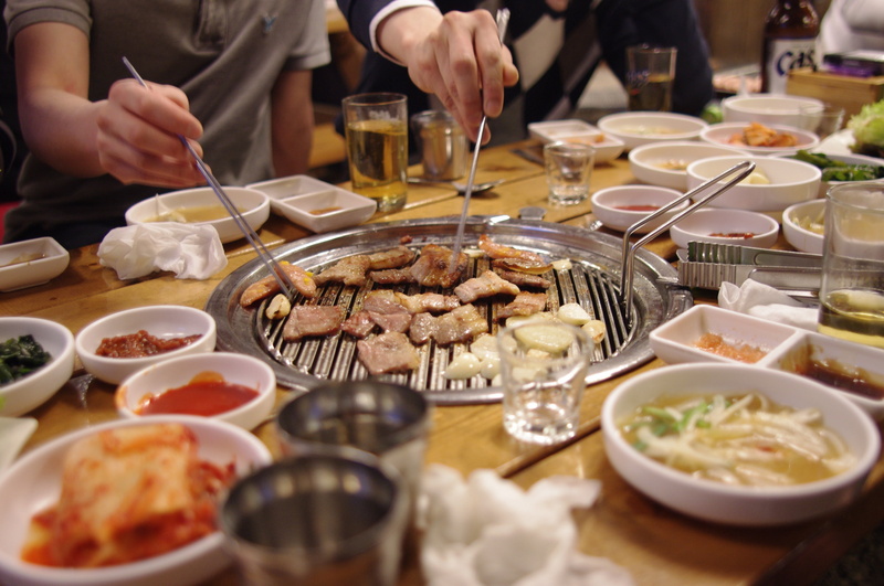 midsection, food, suzhou, restaurant, one person, meal, table, meat, real people, dinner, hand, gourmet, plate, meats, chinese food, glass, freshness, indoors
