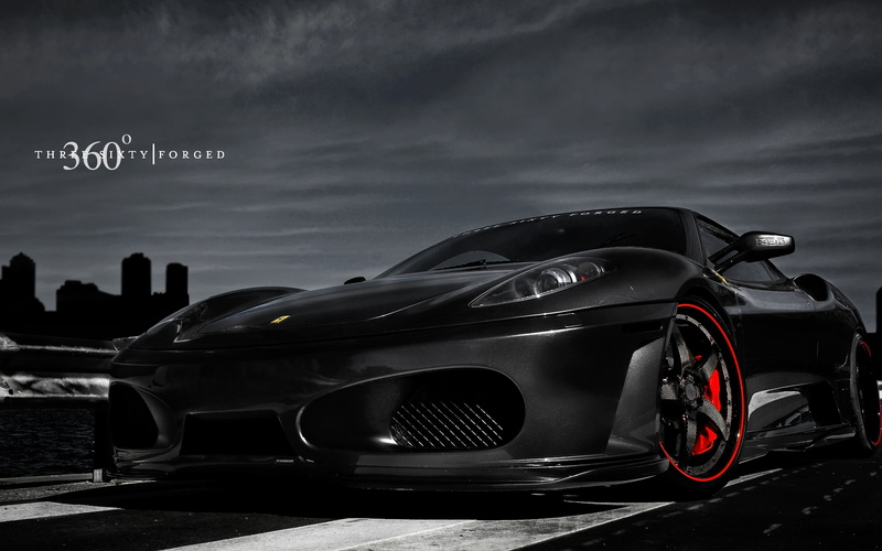 no people, black cars, text, vehicle, headlight, stationary, focus on foreground, car, transportation, 2K, outdoors, Ferrari, western script, land vehicle