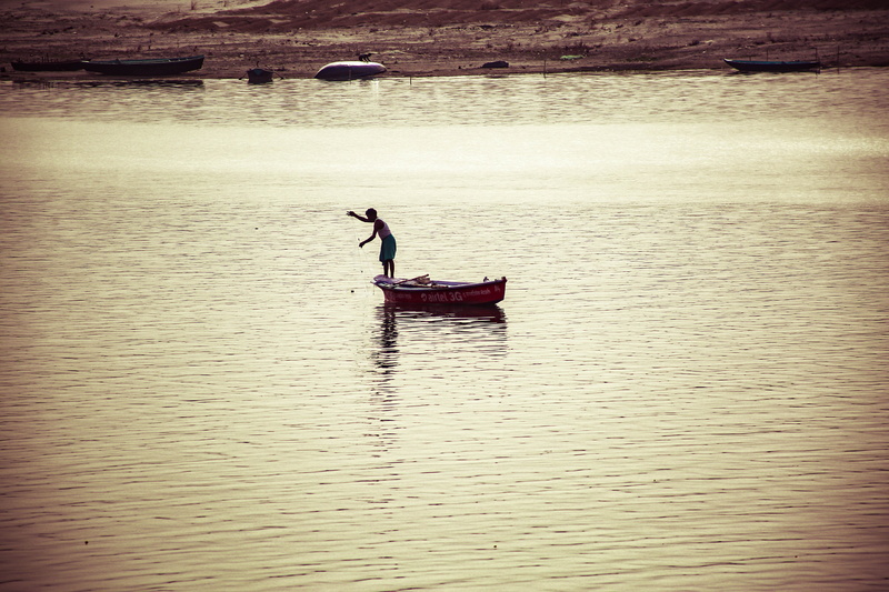 mode of transportation, men, rowboat, water, tranquility, nautical vessel, silhouette, fisherman, transportation, outdoors, real people, scenics - nature