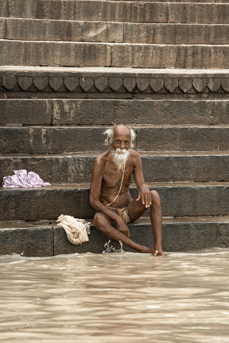 real people, mature men, wall - building feature, architecture, full length, portrait, day, males, sitting, varanasi, man, old, indian, staircase, religion
