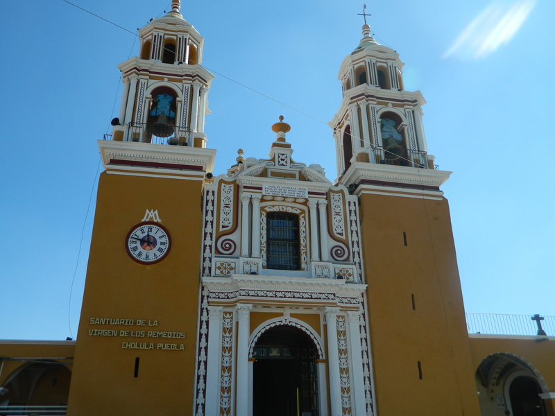 belief, architecture, place of worship, church, outdoors, day, religion, built structure, building, history, puebla, low angle view, clock, arch, tourism