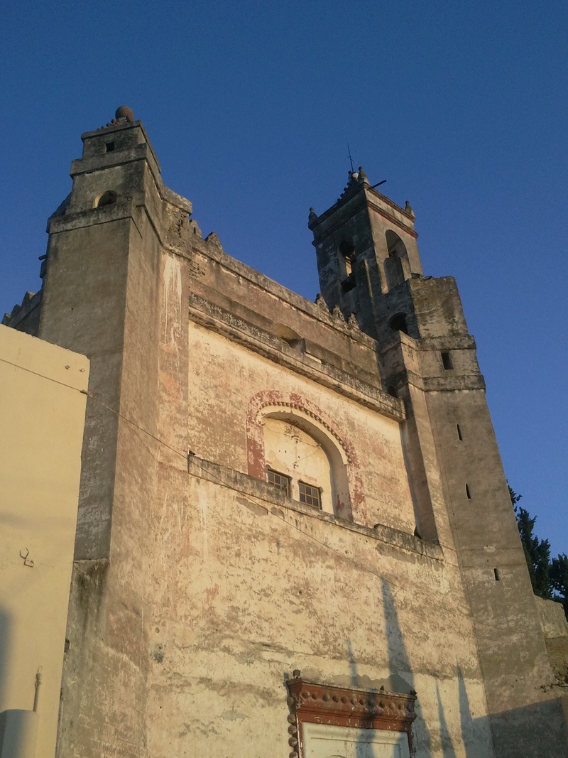 church of tepeaca, tower, building exterior, low angle view, place of worship, blue, no people, mexico, sky, building, spirituality, history, nature, architecture