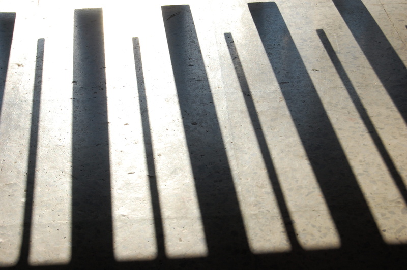2K, wood - material, black, no people, in a row, mexico, parallel, day, repetition, floor, wall - building feature, side by side, backgrounds, focus on shadow