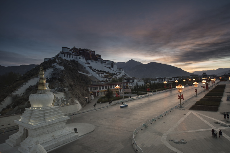 belief, dusk, building exterior, travel destinations, incidental people, sunset, outdoors, architecture, built structure, the potala palace, cloud - sky