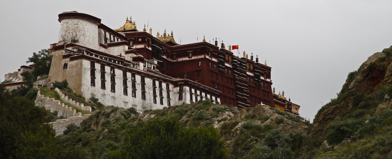 land, architecture, flag, sky, built structure, Potala Palace, the past, Tibet, tourism, outdoors, building, environment, travel destinations, building exterior
