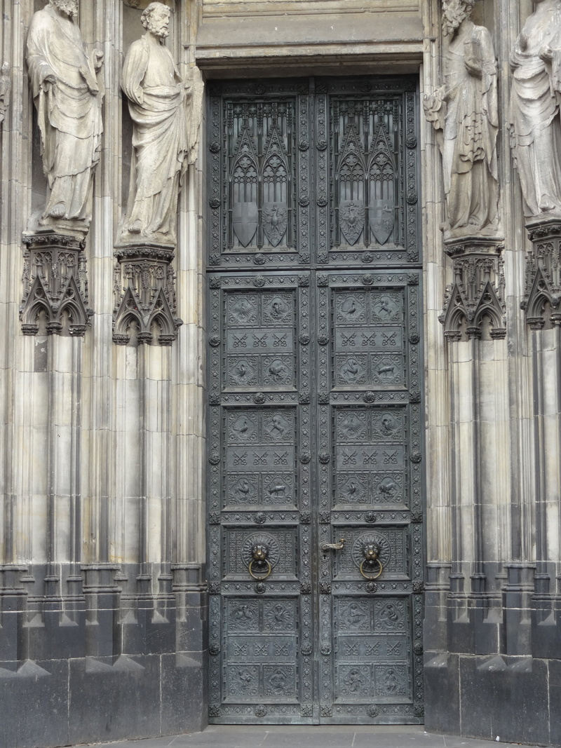 decorative, wall, closed, door, culture, architecture, building exterior, human representation, metal door, travel, art, sculpture, exterior, archs, built structure