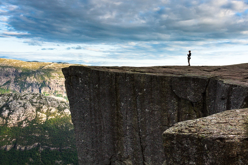 sky, tranquil scene, natural, cloud - sky, 4K, outdoors, mountain, one person, land, leisure activity, beauty in nature, preikestolen, space, rock - object