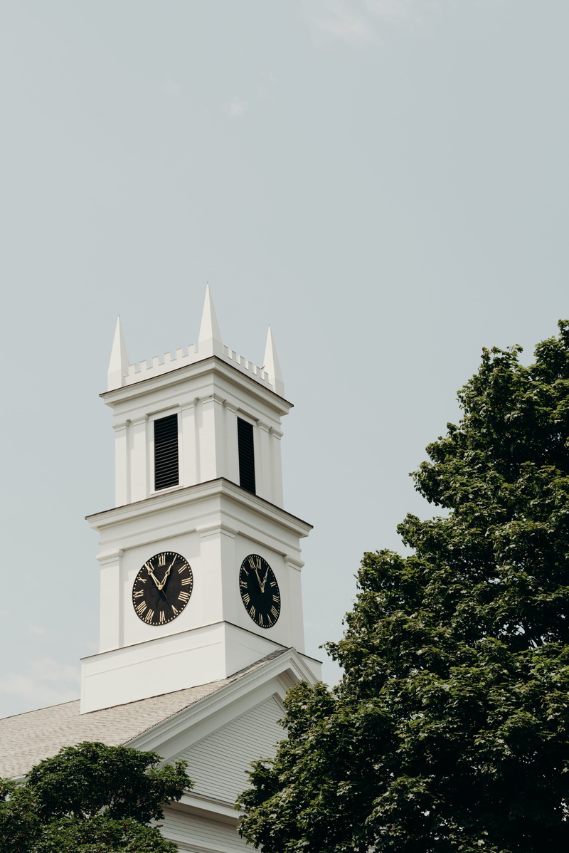 concrete, clock tower, nature, building exterior, place of worship, spirituality, showing, belief, building, tower, white, tree, built structure, low angle view