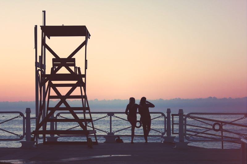 lifestyles, sunset, girls, lifeguard, nature, architecture, marine, leisure activity, water, protection, saver, security, help, rear view, beauty in nature