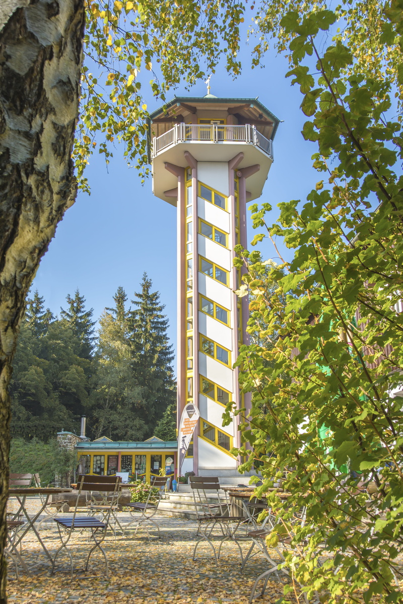 outdoors, architecture, tree, low angle view, tower, sky, observation point, no people, autumn, nature, lookout tower, fall color, building exterior, scheibenberg
