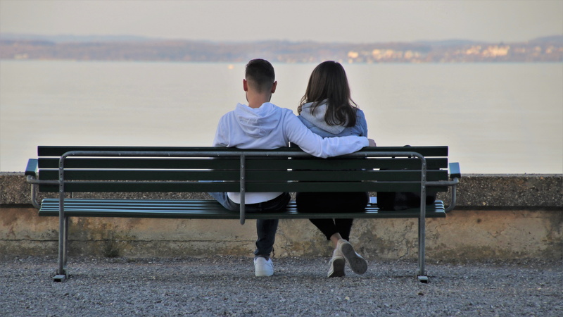 sitting, trust, two, seat, arm around, hairstyle, emotion, bench, people, heterosexual couple, spring, nature, men, outdoors, water, silence, 5K, happy