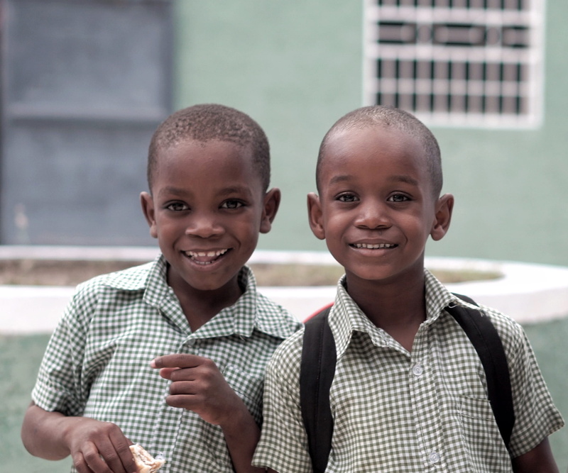 mission, hope, child, headshot, positive emotion, males, haitian, men, person, portrait, human, face, mission work, focus on foreground, two people, happiness