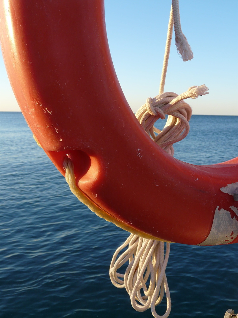 Lifebelt, no people, water, sky, horizon, outdoors, Bank, focus on foreground, metal, 2K, Turkey, nature, day, sea, sunlight, red, hanging, transportation