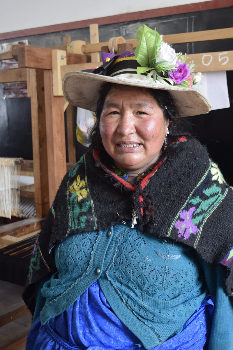 person typical, smiling, women, emotion, hat, portrait, one person, leisure activity, weaver, happiness, looking at camera, mid adult, front view, peruvian
