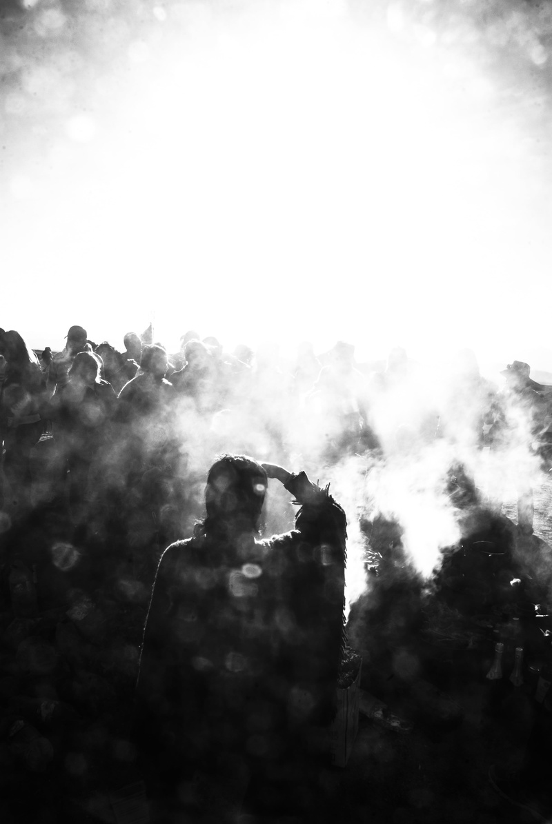 arts culture and entertainment, positive emotion, men, tree, civilization, andean, smoke - physical structure, day, pollution, leisure activity, low angle view