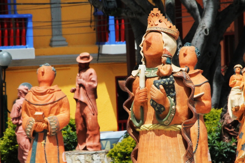 religion, male likeness, carving - craft product, focus on foreground, andean, Ráquira, representation, craft, ceramic, toy, architecture, art, 4K, female likeness