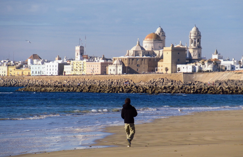 one person, architecture, water, costa, andalusia, 4K, city, day, beach, lifestyles, nature, cathedral, landscape, shore, rear view, outdoors, full length