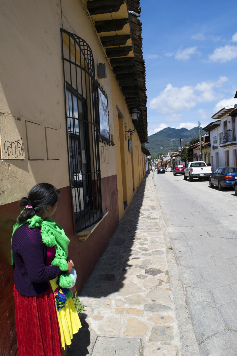 colors, mode of transportation, real people, chiapas, building exterior, day, nature, native, lifestyles, street, standing, traditional clothing, textiles