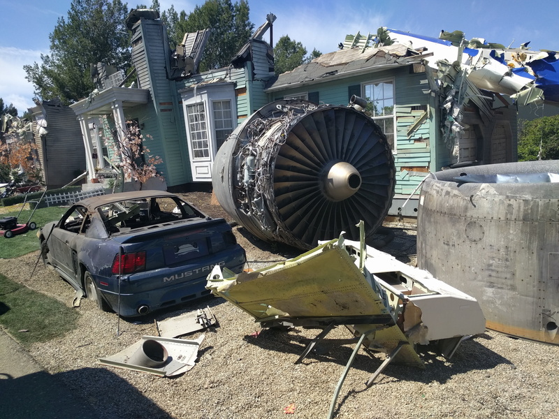 shadow, jet, stationary, mode of transportation, building exterior, no people, flight, transportation, crashing, wreck, plane, airplane, junkyard, day