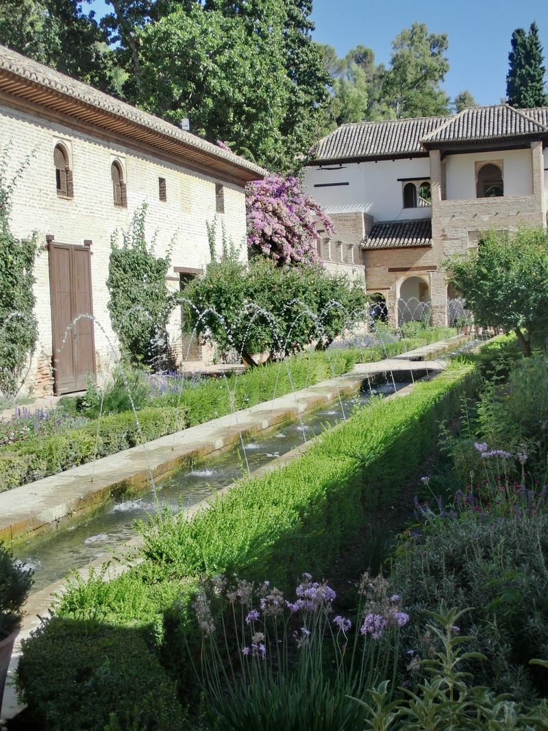 spain, residential district, ornamental garden, flower, house, places of interest, front or back yard, building, outdoors, day, historically, tree, no people