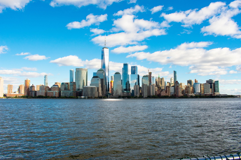 new york skyline, water, tower, day, no people, outdoors, newyork, famous places, spire, city, architecture, skyscraper, iconic landmarks, urban skyline